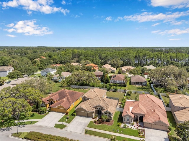 11726 Belle Haven Dr, New Port Richey, FL 34654 - aerial view of residential area with a heavily wooded area