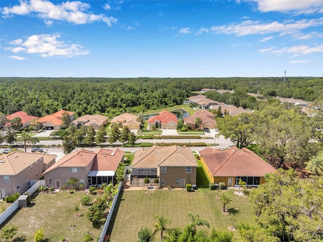 11726 Belle Haven Dr, New Port Richey, FL 34654 - aerial perspective of suburban area featuring a heavily wooded area