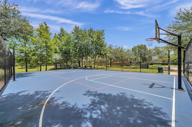 11726 Belle Haven Dr, New Port Richey, FL 34654 - view of sport court featuring community basketball court and view of scattered trees