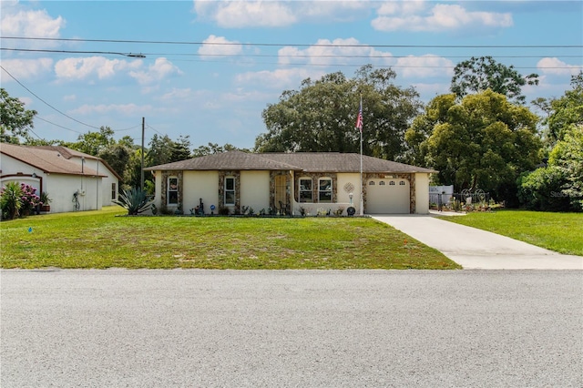 9630 Eldridge Rd, Spring Hill, FL 34608 - single story home featuring concrete driveway, a garage, and a front yard