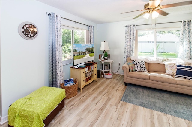 9630 Eldridge Rd, Spring Hill, FL 34608 - living area with light wood-type flooring and ceiling fan