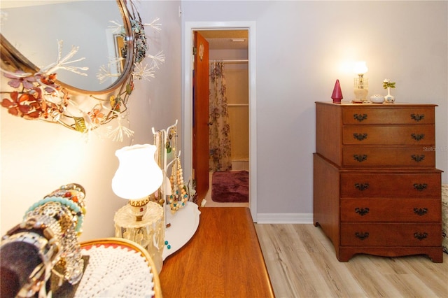9630 Eldridge Rd, Spring Hill, FL 34608 - living area with light wood finished floors and baseboards