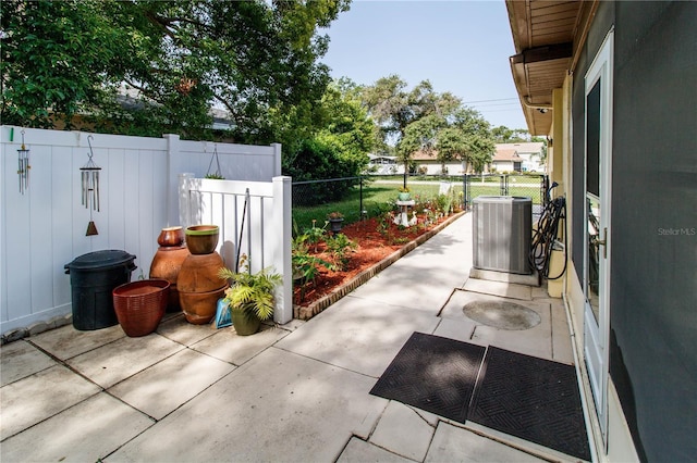9630 Eldridge Rd, Spring Hill, FL 34608 - view of patio with central AC unit