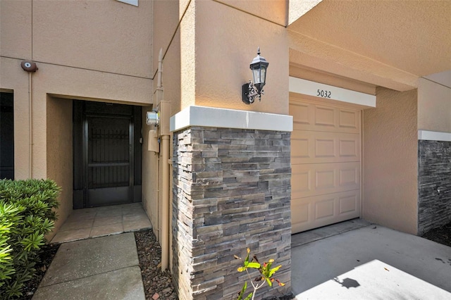 5032 Sand Castle Dr, New Port Richey, FL 34652 - entrance to property with stucco siding
