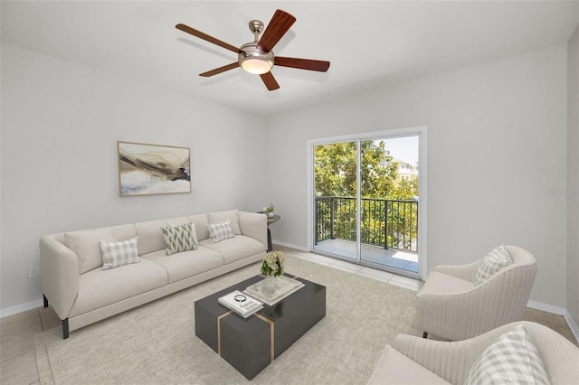 5032 Sand Castle Dr, New Port Richey, FL 34652 - tiled living area featuring ceiling fan and baseboards