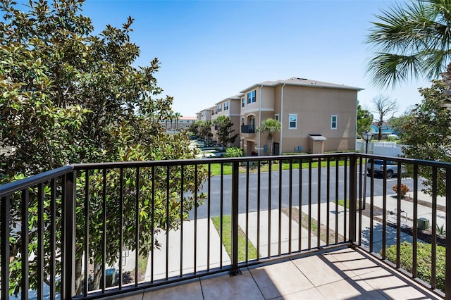 5032 Sand Castle Dr, New Port Richey, FL 34652 - balcony featuring a residential view