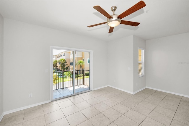 5032 Sand Castle Dr, New Port Richey, FL 34652 - spare room with healthy amount of natural light, a ceiling fan, light tile patterned floors, and a pendent fire sprinkler
