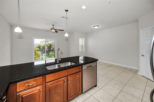 5032 Sand Castle Dr, New Port Richey, FL 34652 - kitchen with dishwasher, a ceiling fan, pendant lighting, light tile patterned flooring, and brown cabinets