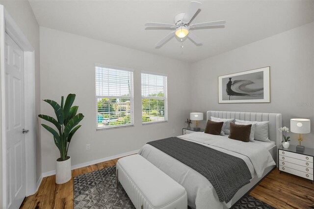 5032 Sand Castle Dr, New Port Richey, FL 34652 - bedroom with wood finished floors and a ceiling fan