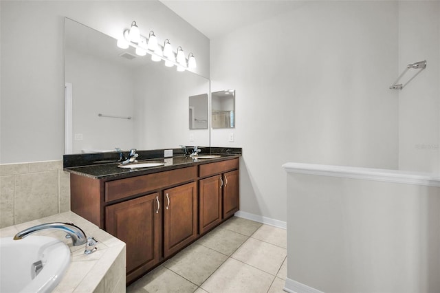 5032 Sand Castle Dr, New Port Richey, FL 34652 - full bathroom featuring double vanity, a bath, and tile patterned flooring