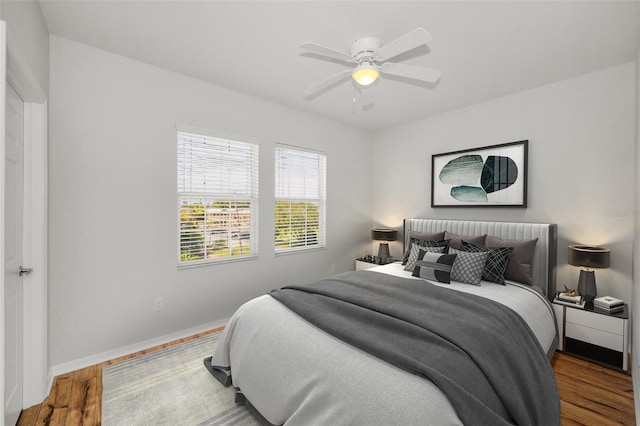 5032 Sand Castle Dr, New Port Richey, FL 34652 - bedroom featuring wood finished floors and a ceiling fan