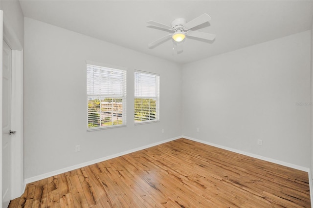5032 Sand Castle Dr, New Port Richey, FL 34652 - unfurnished room with hardwood / wood-style flooring and ceiling fan