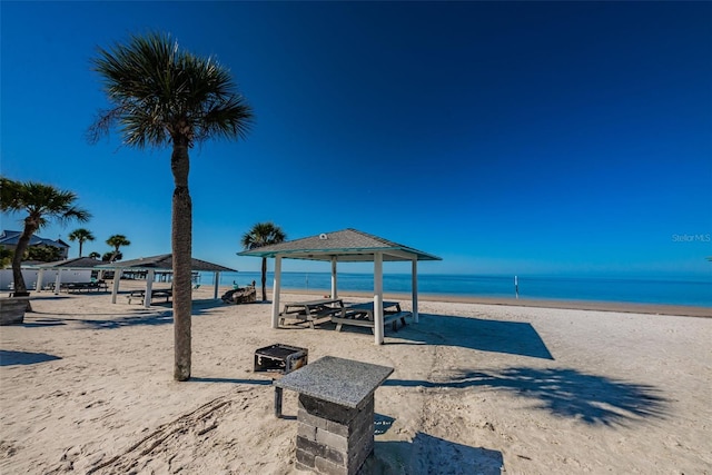 5032 Sand Castle Dr, New Port Richey, FL 34652 - view of community featuring a gazebo and view of water and beach