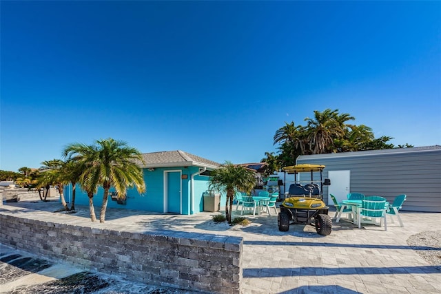 5032 Sand Castle Dr, New Port Richey, FL 34652 - view of patio featuring outdoor dining space