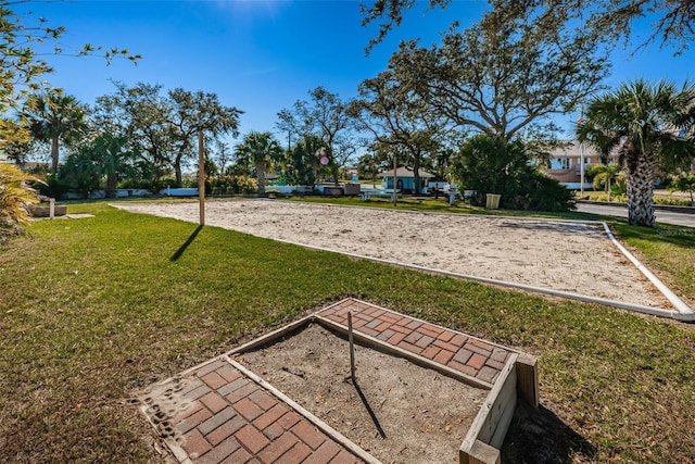 5032 Sand Castle Dr, New Port Richey, FL 34652 - view of home's community with volleyball court and a lawn