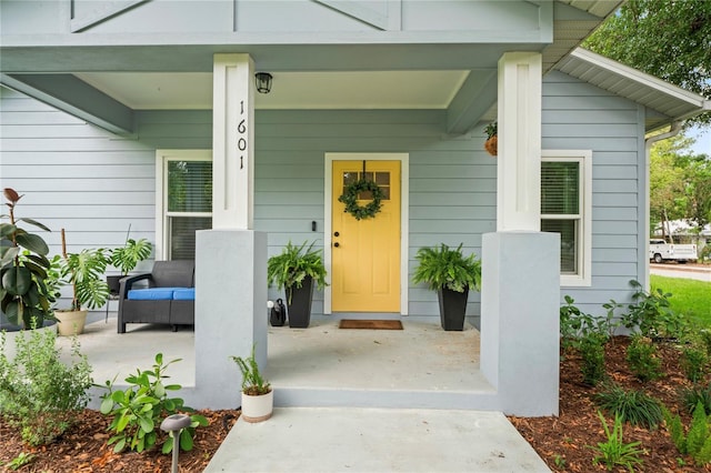 1601 E 98th Ave, Tampa, FL 33612 - doorway to property with covered porch