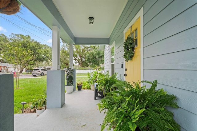 1601 E 98th Ave, Tampa, FL 33612 - porch featuring a lawn