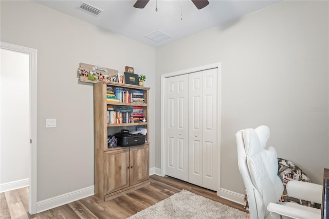 1601 E 98th Ave, Tampa, FL 33612 - office space featuring ceiling fan, wood finished floors, and baseboards
