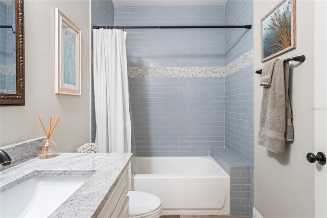 1601 E 98th Ave, Tampa, FL 33612 - bathroom featuring vanity, shower / bath combo, and toilet