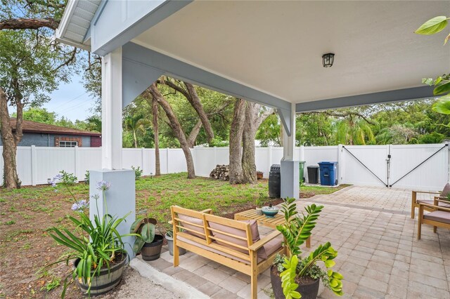 1601 E 98th Ave, Tampa, FL 33612 - fenced backyard with a patio and a gate
