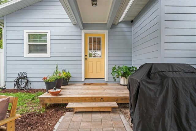 1601 E 98th Ave, Tampa, FL 33612 - doorway to property with a deck