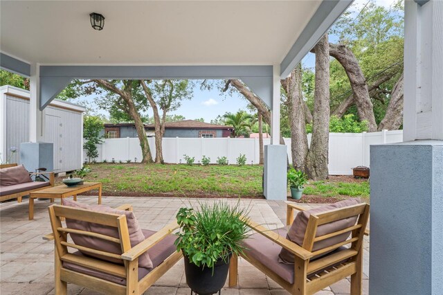 1601 E 98th Ave, Tampa, FL 33612 - fenced backyard with a patio
