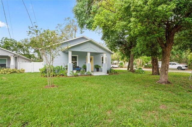 1601 E 98th Ave, Tampa, FL 33612 - bungalow-style home with a porch