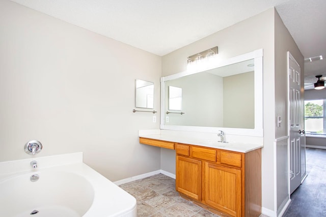 10386 Norvell Rd, Spring Hill, FL 34608 - bathroom featuring a garden tub and vanity