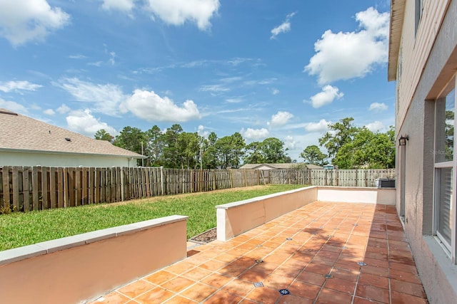 10386 Norvell Rd, Spring Hill, FL 34608 - fenced backyard featuring a patio