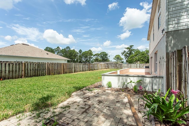 10386 Norvell Rd, Spring Hill, FL 34608 - fenced backyard featuring a patio area