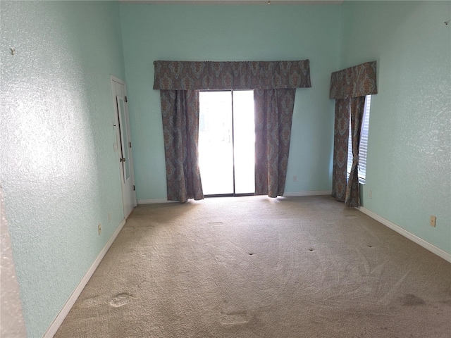 10244 Hoover St, Spring Hill, FL 34608 - carpeted spare room featuring a textured wall