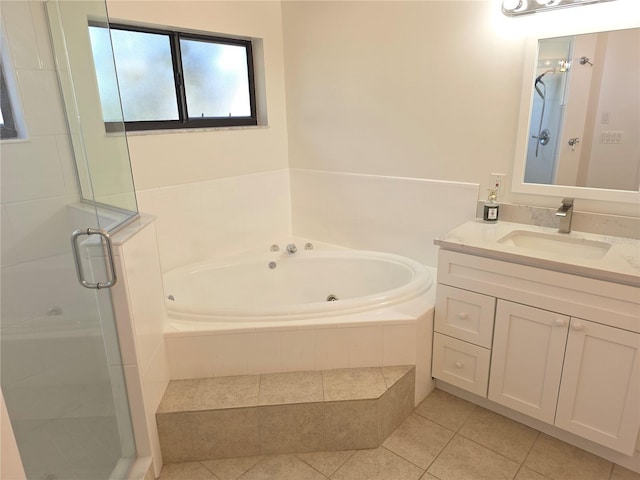 10244 Hoover St, Spring Hill, FL 34608 - bathroom featuring a shower stall, vanity, a whirlpool tub, and tile patterned flooring