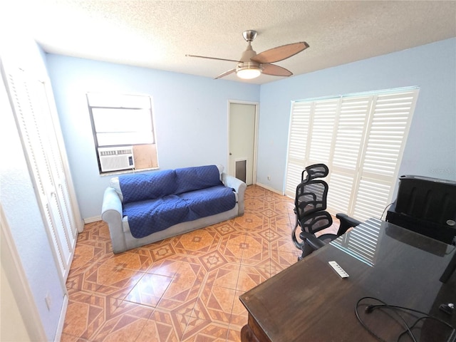 10244 Hoover St, Spring Hill, FL 34608 - office area with a ceiling fan, a textured ceiling, light tile patterned flooring, and cooling unit