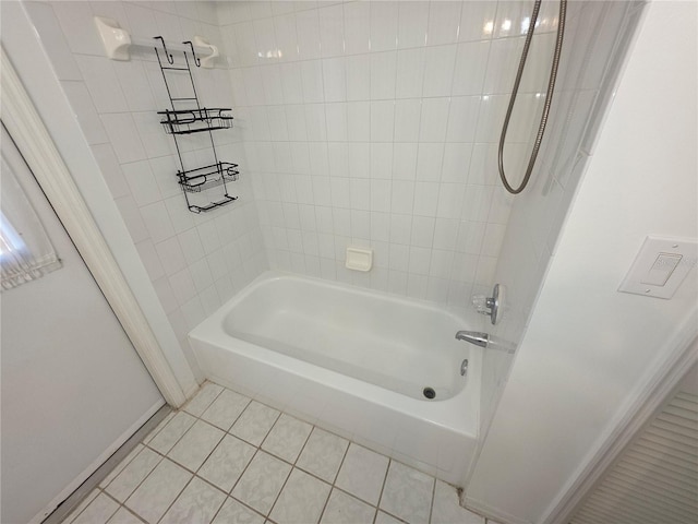 10244 Hoover St, Spring Hill, FL 34608 - bathroom featuring shower / washtub combination and tile patterned flooring