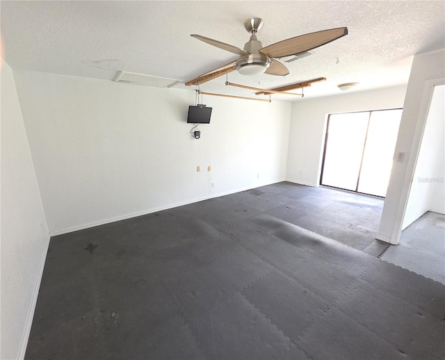 10244 Hoover St, Spring Hill, FL 34608 - empty room with a ceiling fan and a textured ceiling