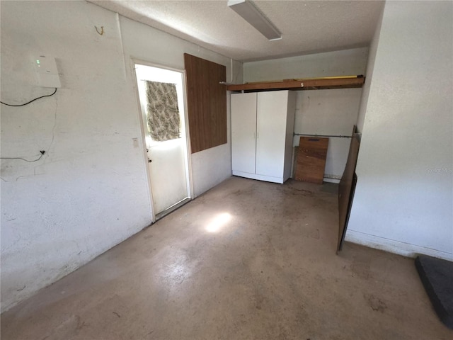 10244 Hoover St, Spring Hill, FL 34608 - unfurnished bedroom with unfinished concrete flooring and a closet