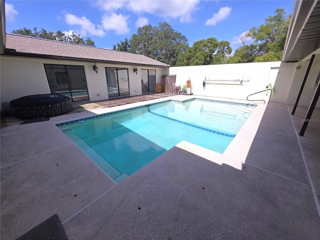 10244 Hoover St, Spring Hill, FL 34608 - view of pool featuring a jacuzzi and a patio area