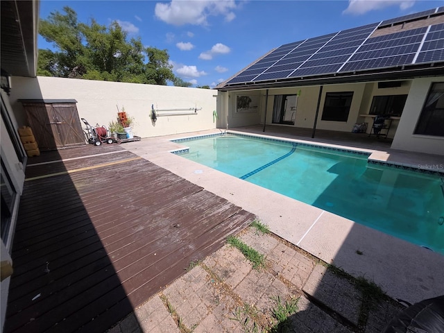 10244 Hoover St, Spring Hill, FL 34608 - view of pool featuring a patio, a fenced backyard, and a deck
