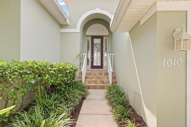 1010 Teal Pointe, Tarpon Springs, FL 34689 - view of exterior entry featuring stucco siding