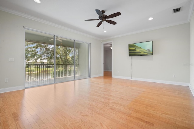 1010 Teal Pointe, Tarpon Springs, FL 34689 - unfurnished room with a ceiling fan, crown molding, light wood-type flooring, and recessed lighting