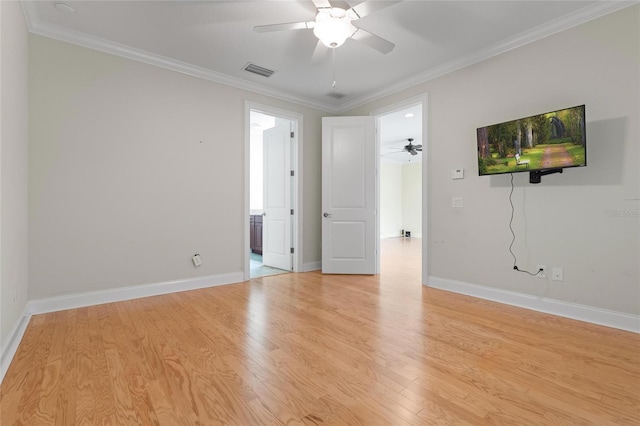 1010 Teal Pointe, Tarpon Springs, FL 34689 - empty room featuring a ceiling fan, light wood-style flooring, and ornamental molding