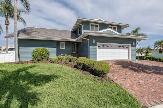 3150 Trident Ter, New Port Richey, FL 34652 - traditional-style house featuring decorative driveway and an attached garage