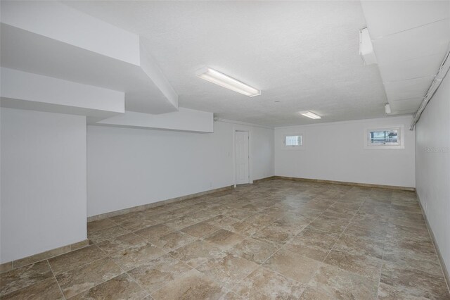 3150 Trident Ter, New Port Richey, FL 34652 - spare room with stone finish floors and baseboards