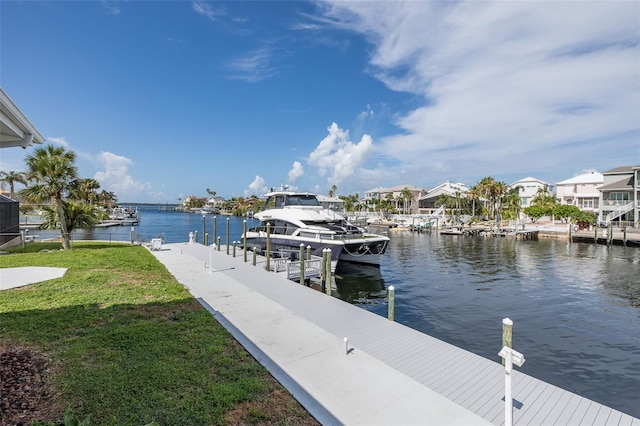 3150 Trident Ter, New Port Richey, FL 34652 - dock featuring a water view and a lawn