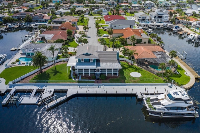 3150 Trident Ter, New Port Richey, FL 34652 - aerial perspective of suburban area with a large body of water