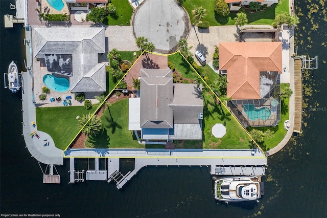 3150 Trident Ter, New Port Richey, FL 34652 - drone / aerial view of a pool and a nearby body of water