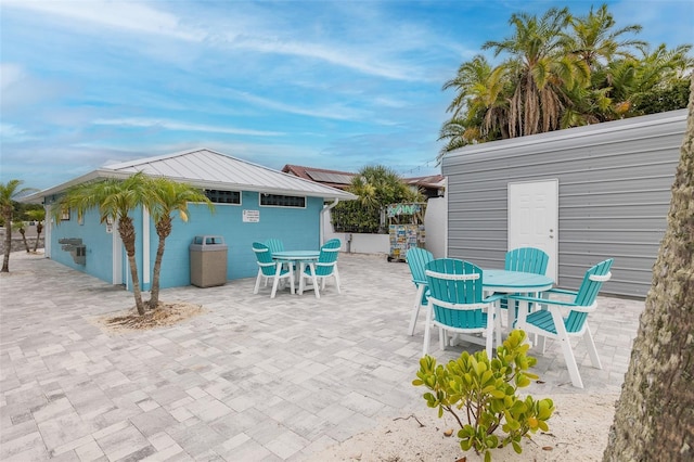 3150 Trident Ter, New Port Richey, FL 34652 - view of patio / terrace with outdoor dining space