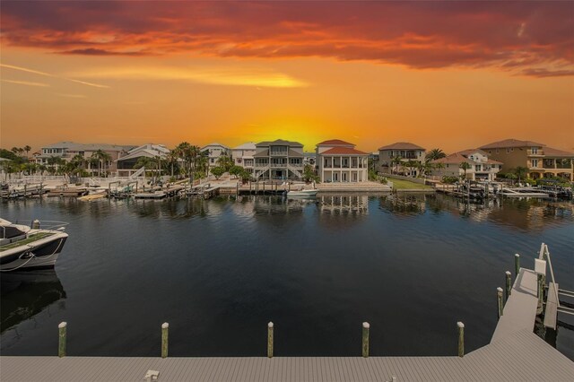 3150 Trident Ter, New Port Richey, FL 34652 - dock area with a water view and a residential view