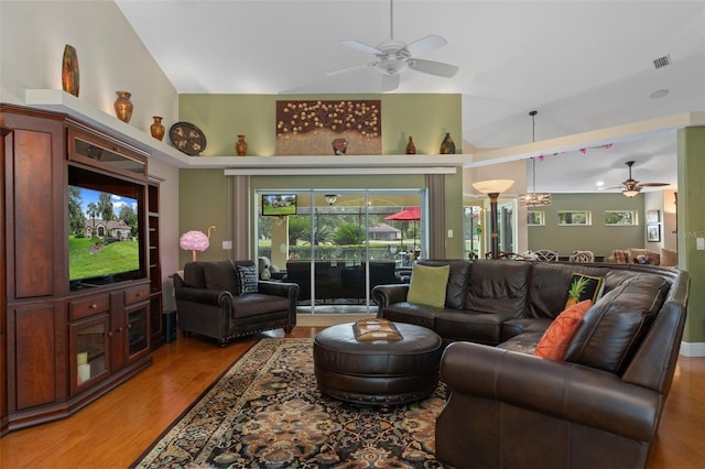 690 E Jenkins Ct, Hernando, FL 34442 - living room with a ceiling fan, light wood-type flooring, and vaulted ceiling