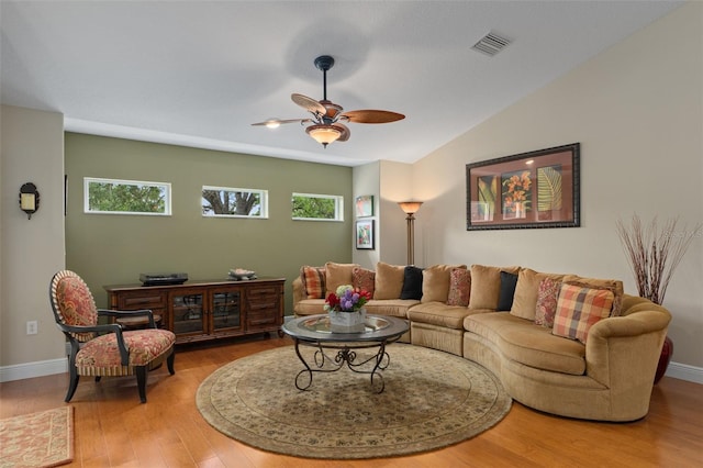 690 E Jenkins Ct, Hernando, FL 34442 - living room featuring a ceiling fan, wood finished floors, and lofted ceiling